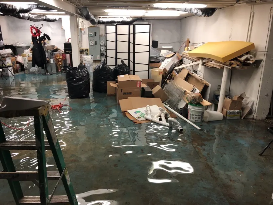 Flooded basement being cleaned in a Marietta, GA home